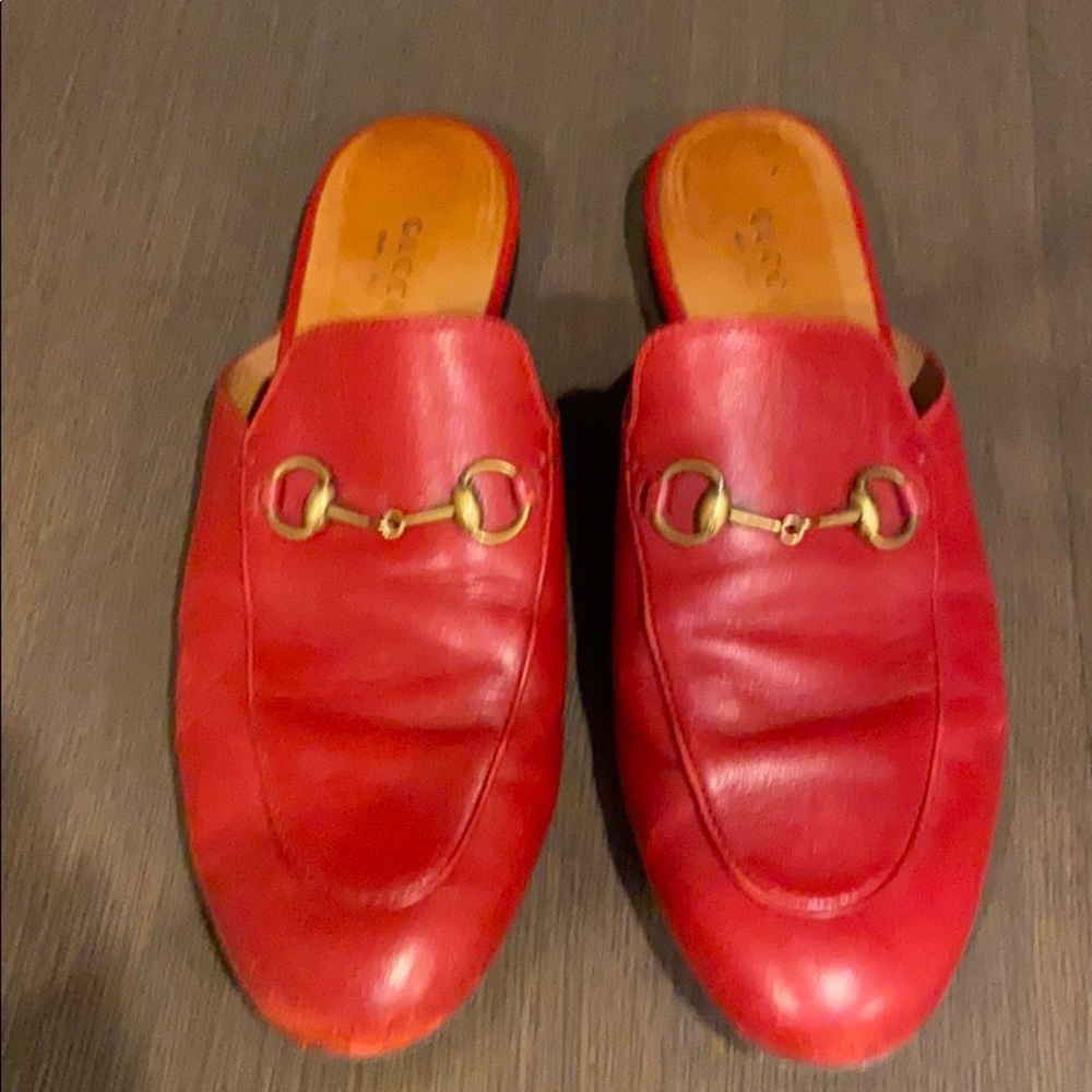 Red Gucci loafer slides